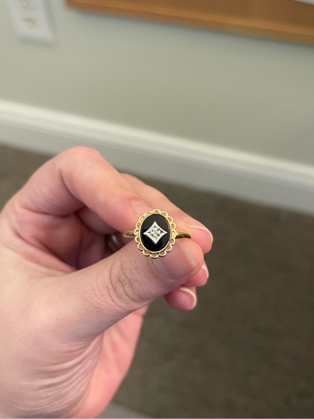 Gold Ring with Black Onyx and Small Center Diamond